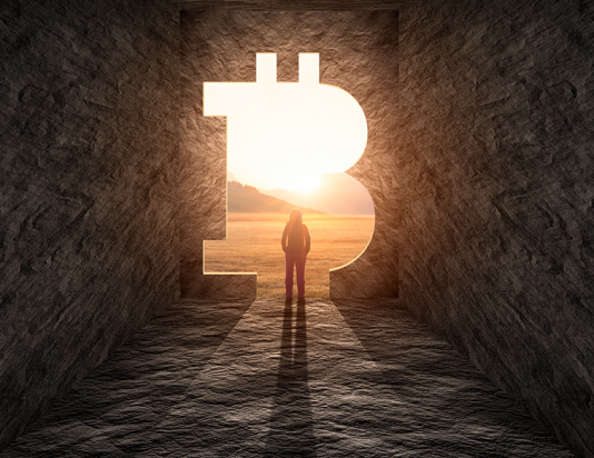 A person stands before a tunnel, with a large bitcoin symbol glowing in the background.