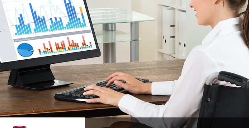 Woman typing on a computer